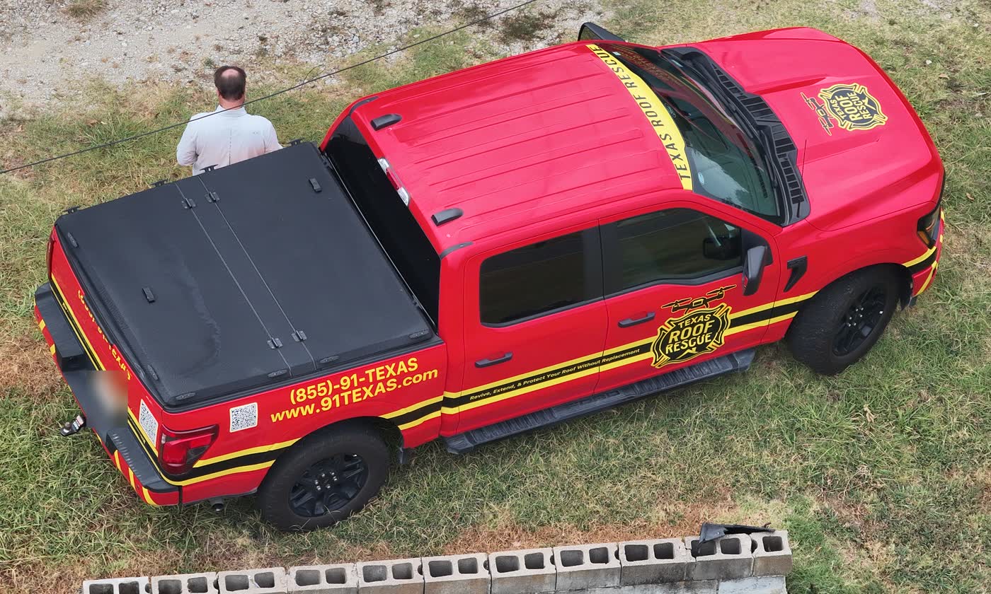 Texas Roof Rescue trucks on site